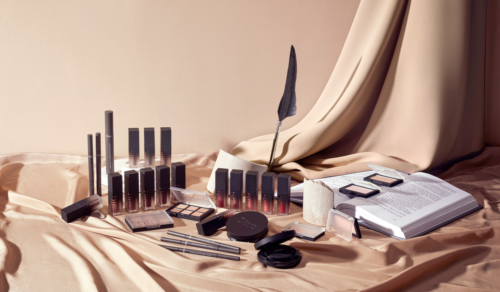 Unveiling DINTO: The Korean Cosmetic Brand Elevating Beauty with Innovation and Elegance. A collection of elegant DINTO cosmetics displayed elegantly.