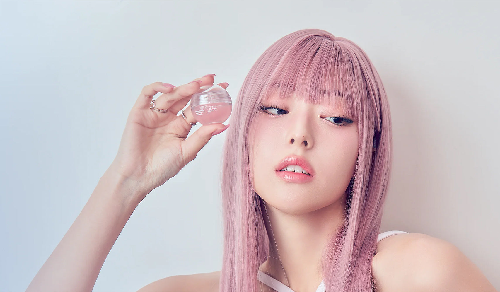 Model showcasing Illuminate Your Beauty with GLOW: A Luxury K-Beauty Experience product