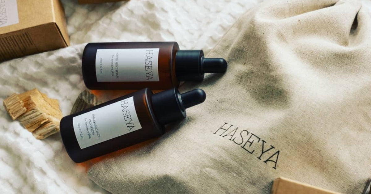 Glow with HASEYA: Your Passport to Fun and Flawless K-Beauty products displayed with a HASEYA branded cloth bag