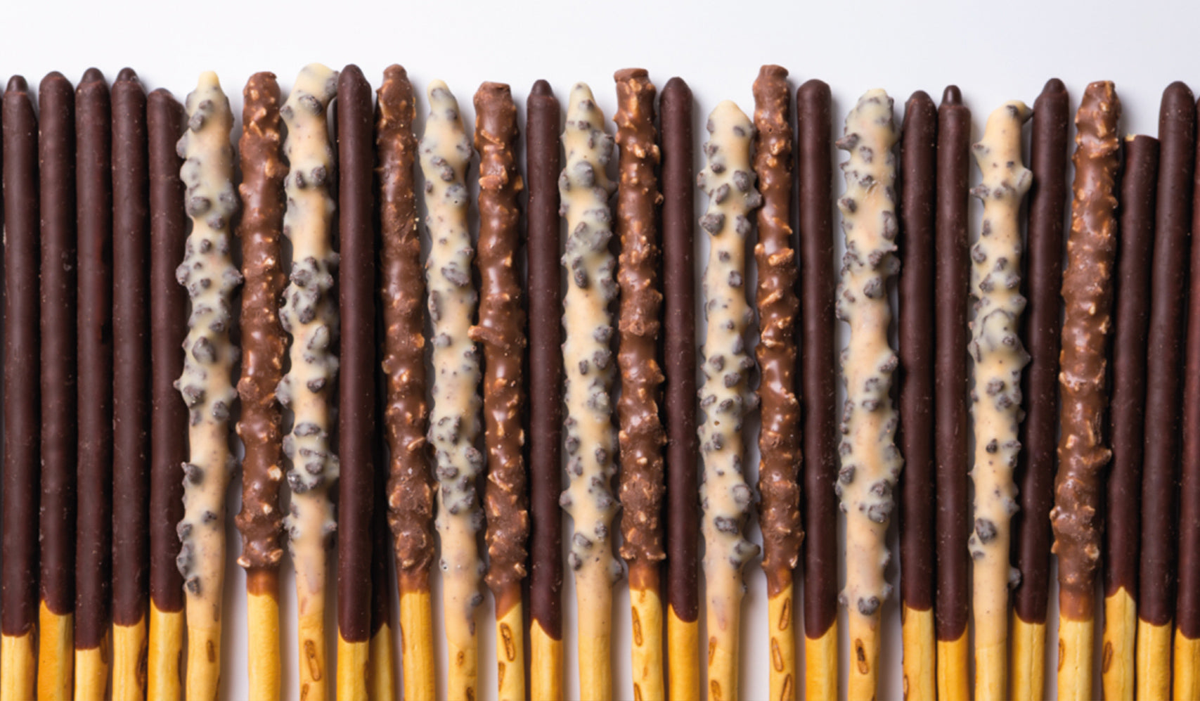 Explore the Delicious World of LOTTE: A Taste of Korean Snack Culture with chocolate-covered stick snacks.