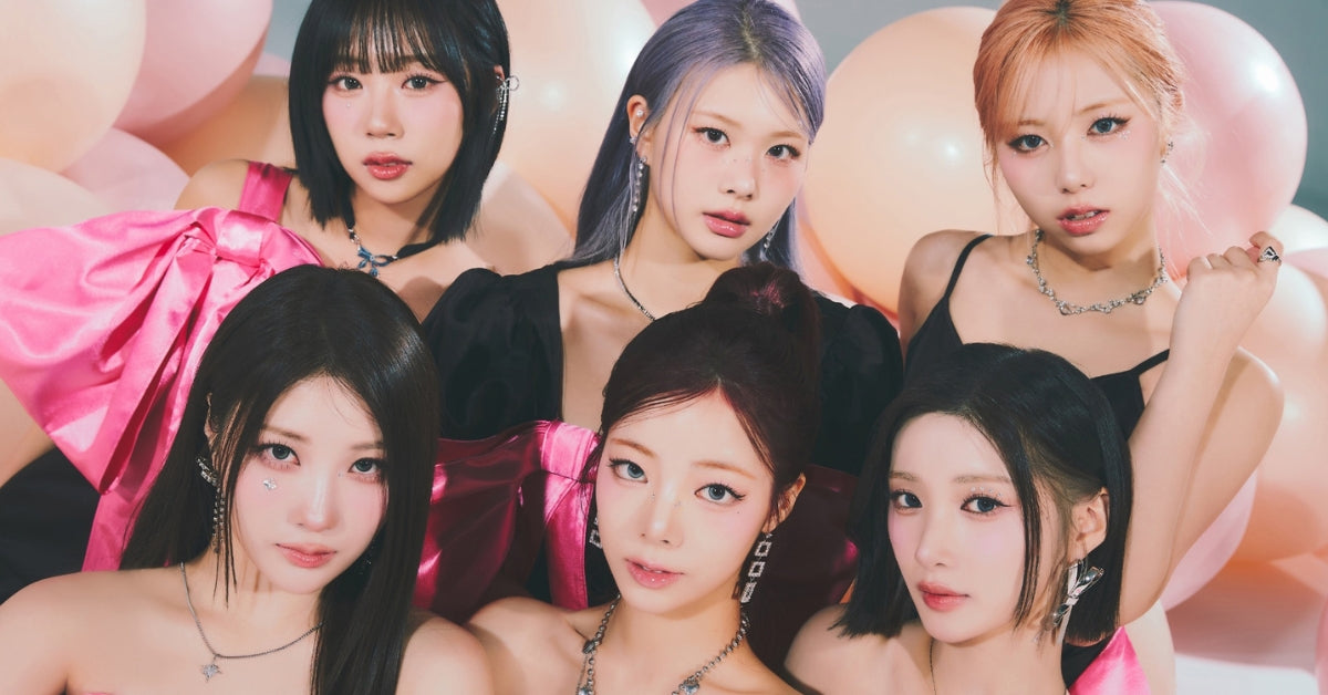 Step into the Sparkling Purple World of PURPLE KISS: group photo with pink and purple balloons
