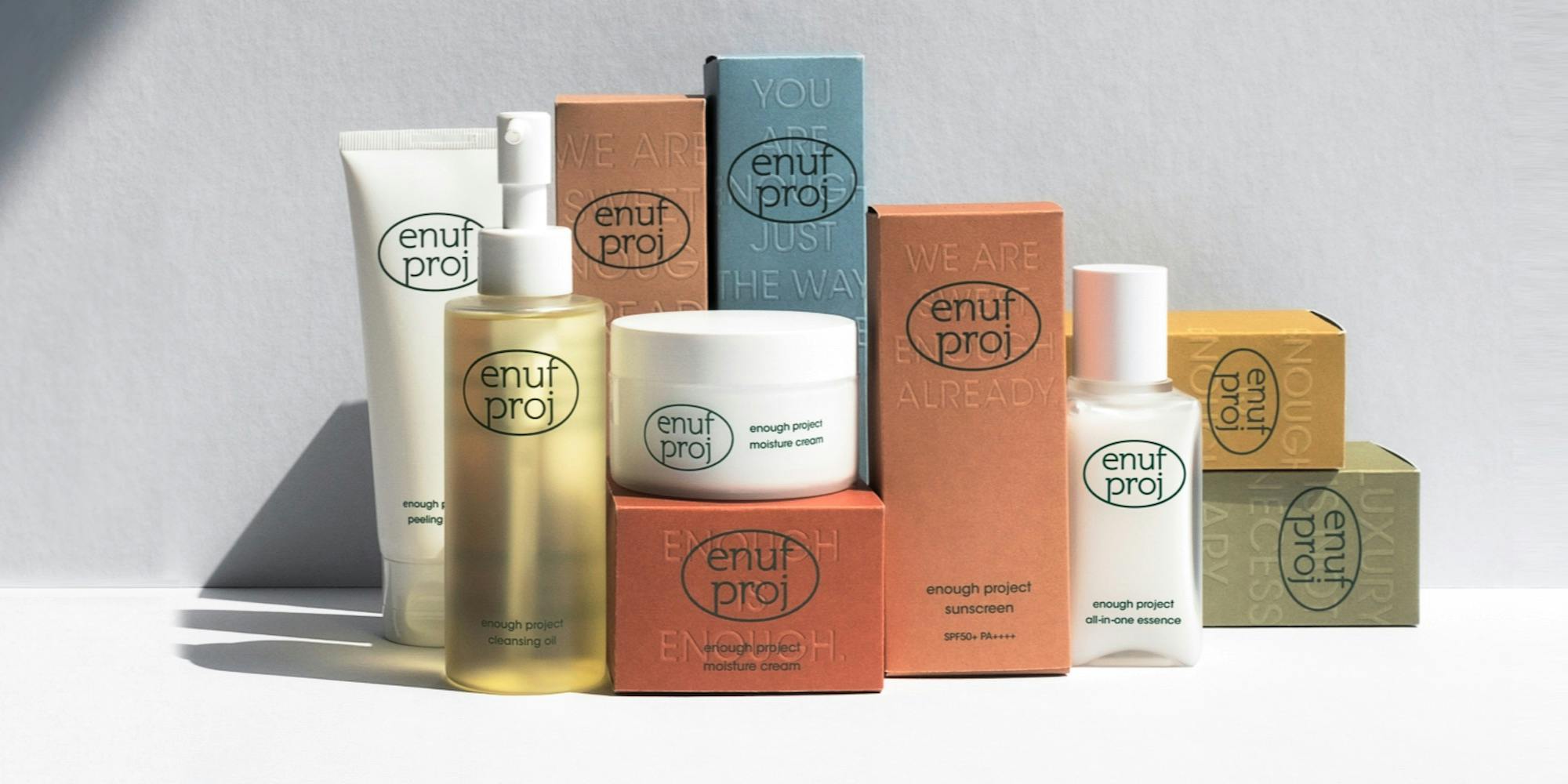 Transform Your Routine with Enough Project’s Minimalist Skincare products displayed on a shelf, featuring clean beauty packaging.