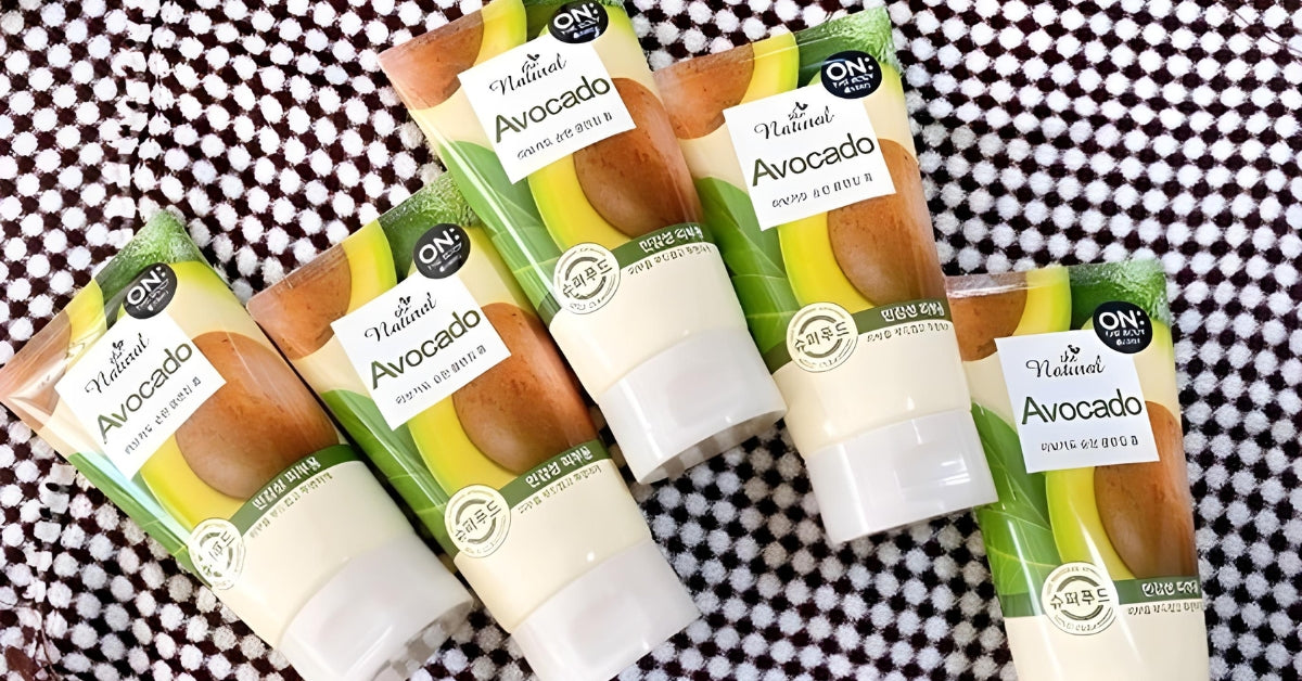ON THE BODY: Embrace the Beauty of Nature with Nourishing Skincare Ingredients! Avocado tubes on a patterned cloth.