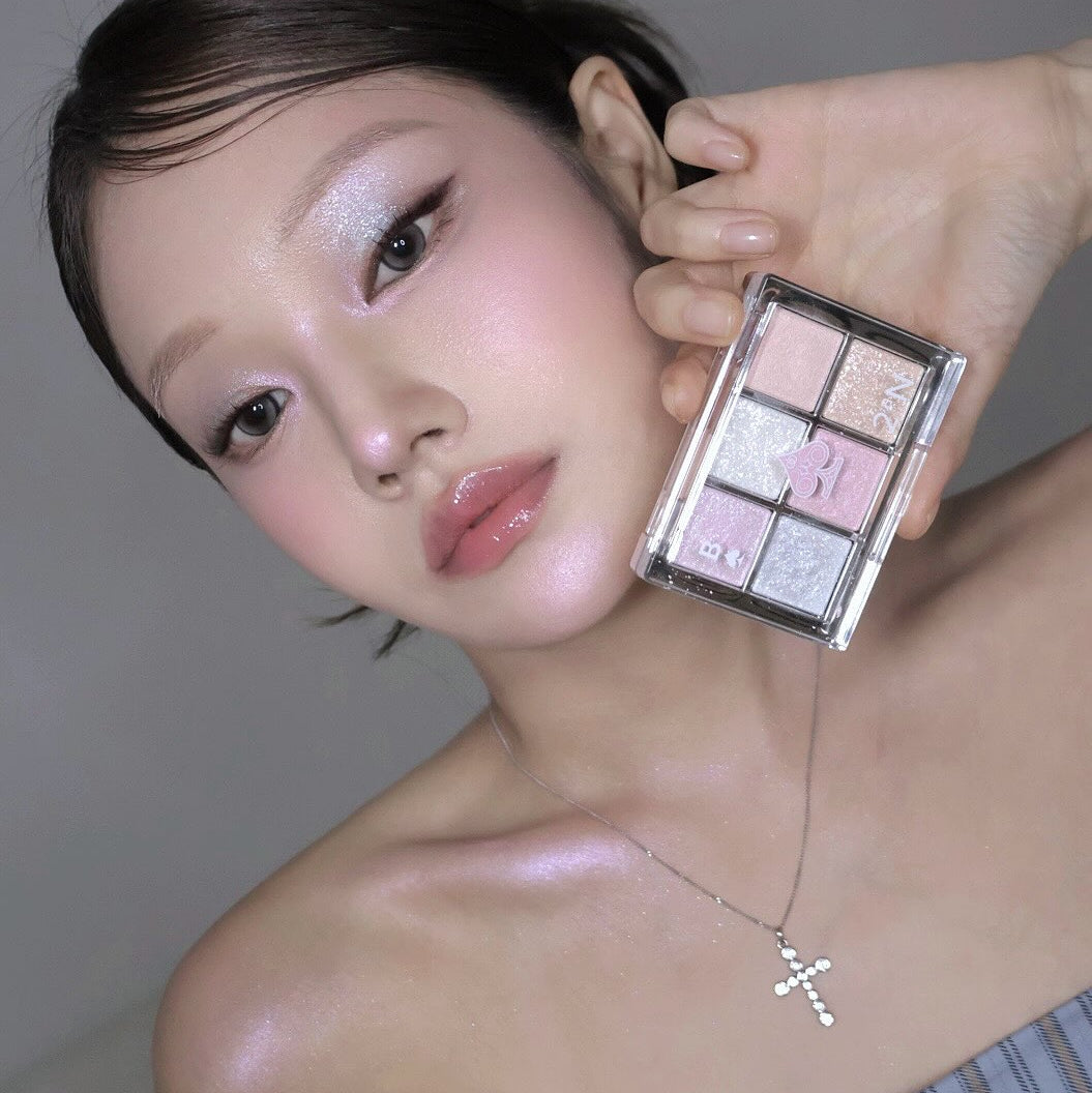 Model showcasing 2AN Better Me Eye Palette 4.5g with glittery eyeshadow shades.