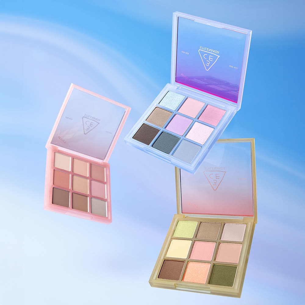 3CE Multi Eye Color Palette 7g in various shades for versatile eye makeup looks, featuring 9-color blocks in pink, blue, and yellow cases.