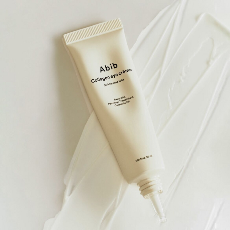 ABIB Collagen Eye Cream Resurrection Herb Tube 30ml on a creamy textured surface