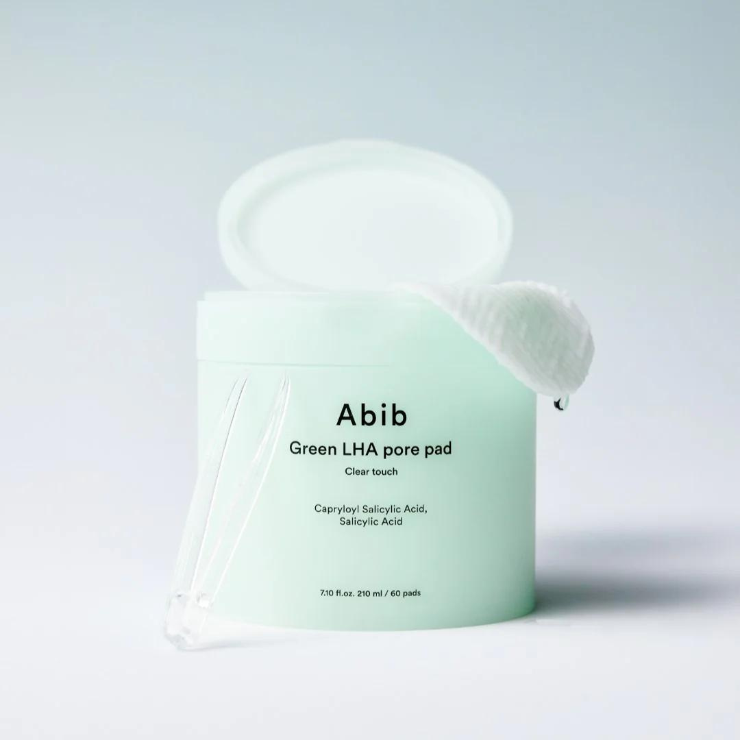 ABIB Green LHA Pore Pad Clear Touch 60 Sheets container with open lid and cotton pad