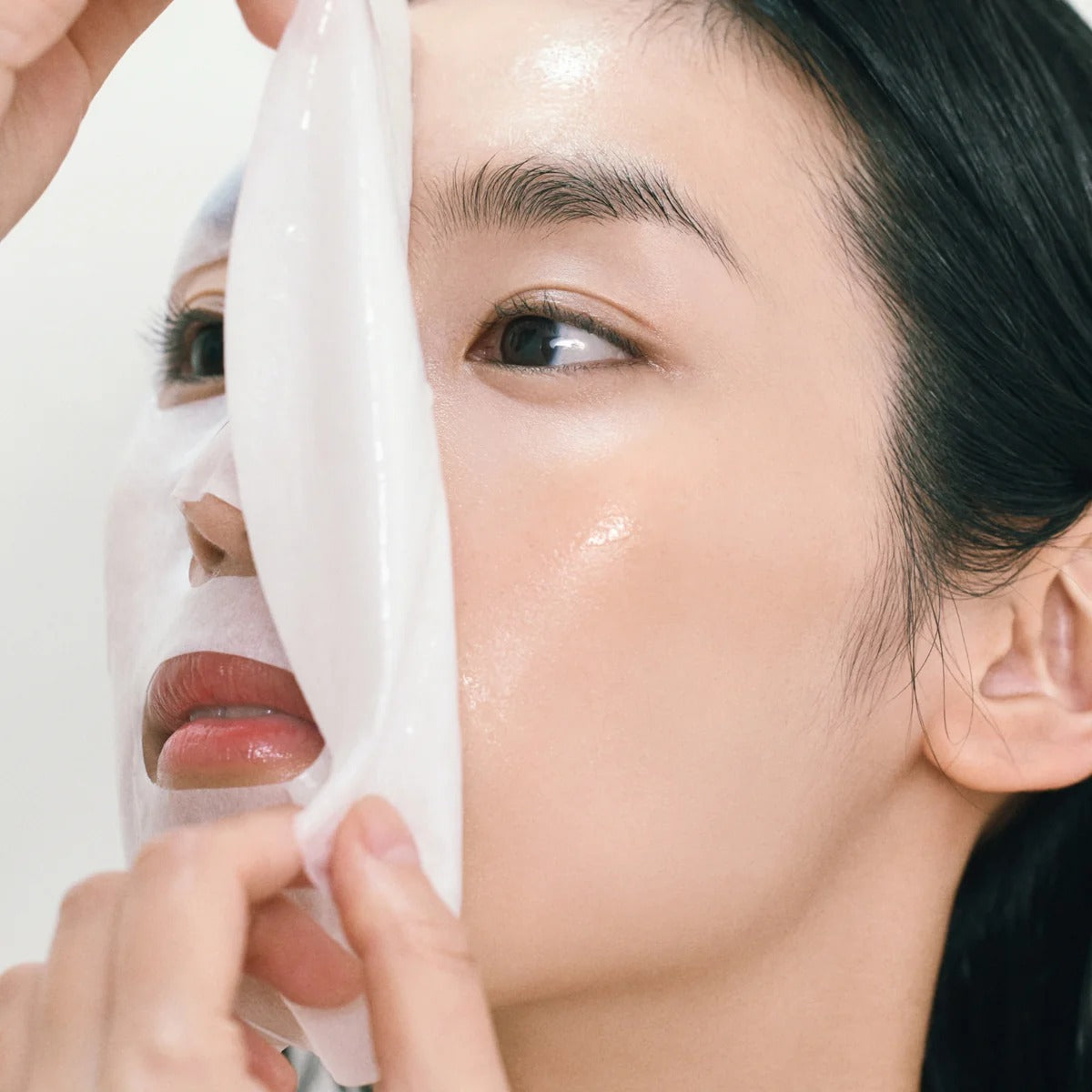 Person applying ABIB Gummy Sheets Mask Collagen Milk Sticker 10 sheets