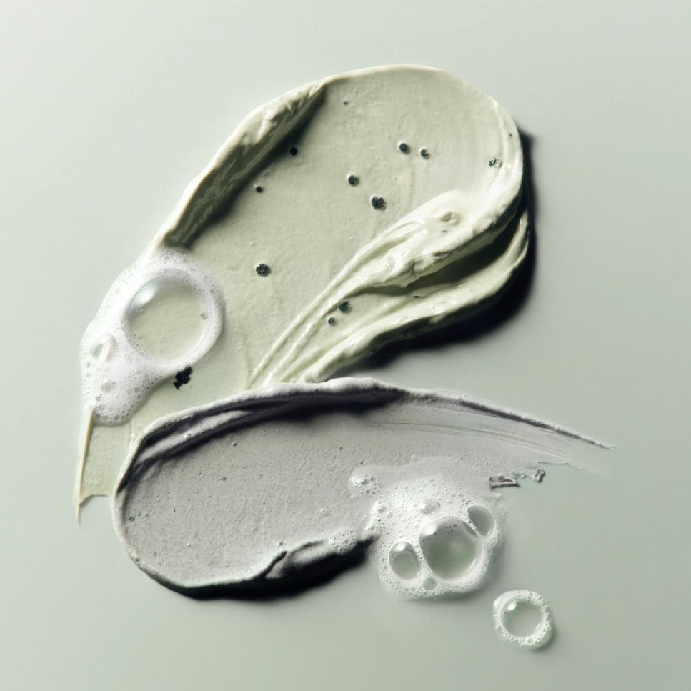 Texture of ABIB Pore Clay Pack Cleanser 120ml showing green and grey clay swirls with bubbles