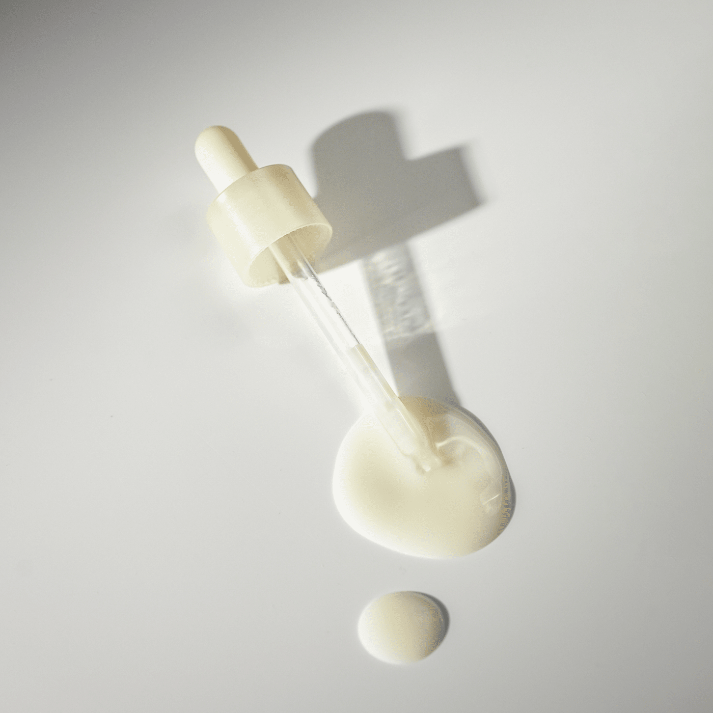 Dropper with ABIB Resurrection Bifida Serum Firming Drops 50ml on a white surface