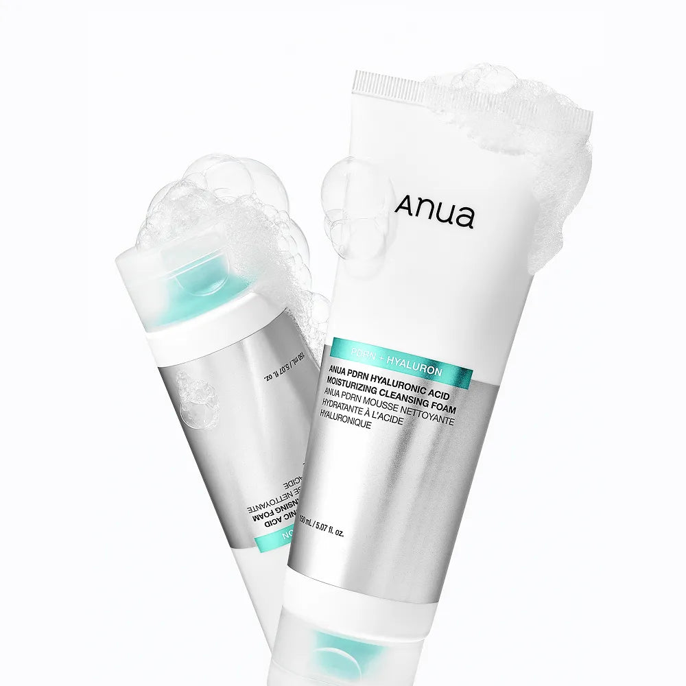 ANUA PDRN Hyaluronic Acid Moisture Cleansing Foam 150ml with bubbling foam texture in white and aqua packaging.