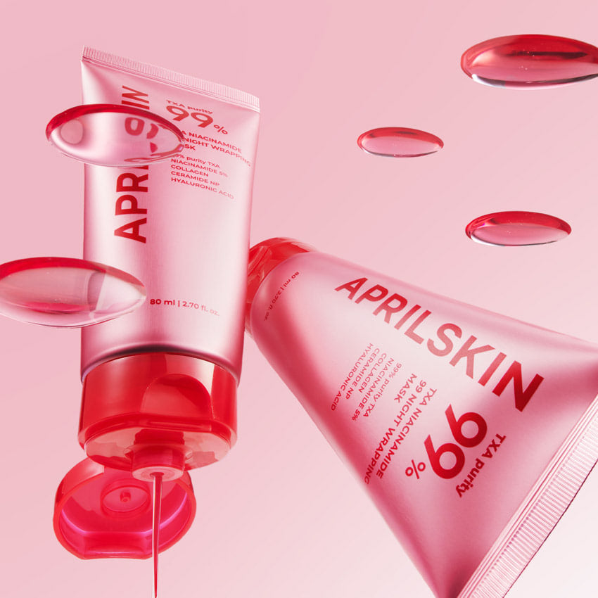 APRILSKIN TXA Niacinamide 99 Night Wrapping Mask 80ml on pink background with product highlights and droplets