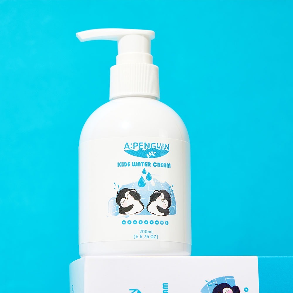 ATOMANDE Arctic Penguin Kids Children's Water Essence Moisture Cream Body Lotion 200ml bottle with blue background.