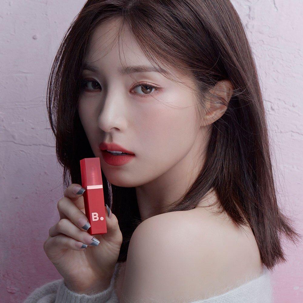 Person holding BANILA CO New Sheer Velvet Veil Tint showcasing makeup product