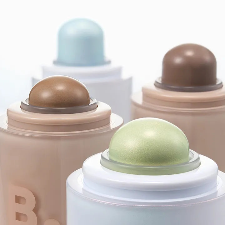 Close-up of BANILA CO Romantic Blush Highlighter, showcasing different shades in elegant packaging.