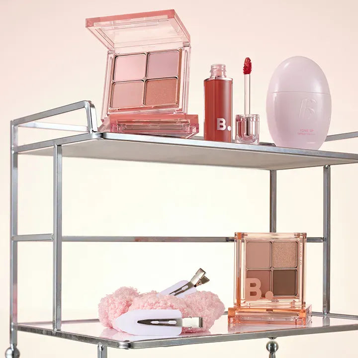 BANILACO Mood On Eye Palette displayed with other cosmetic products on a metal shelf in a stylish setting.
