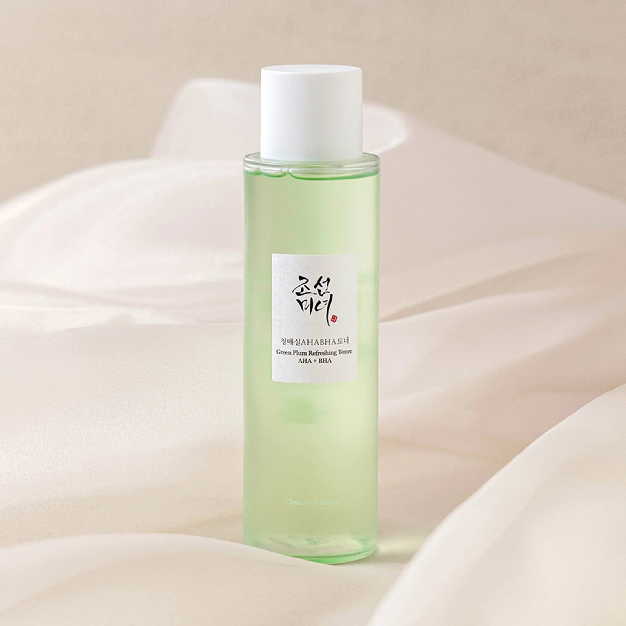BEAUTY OF JOSEON Green Plum Refreshing Toner AHA + BHA 150ml in a light green bottle on a soft background.