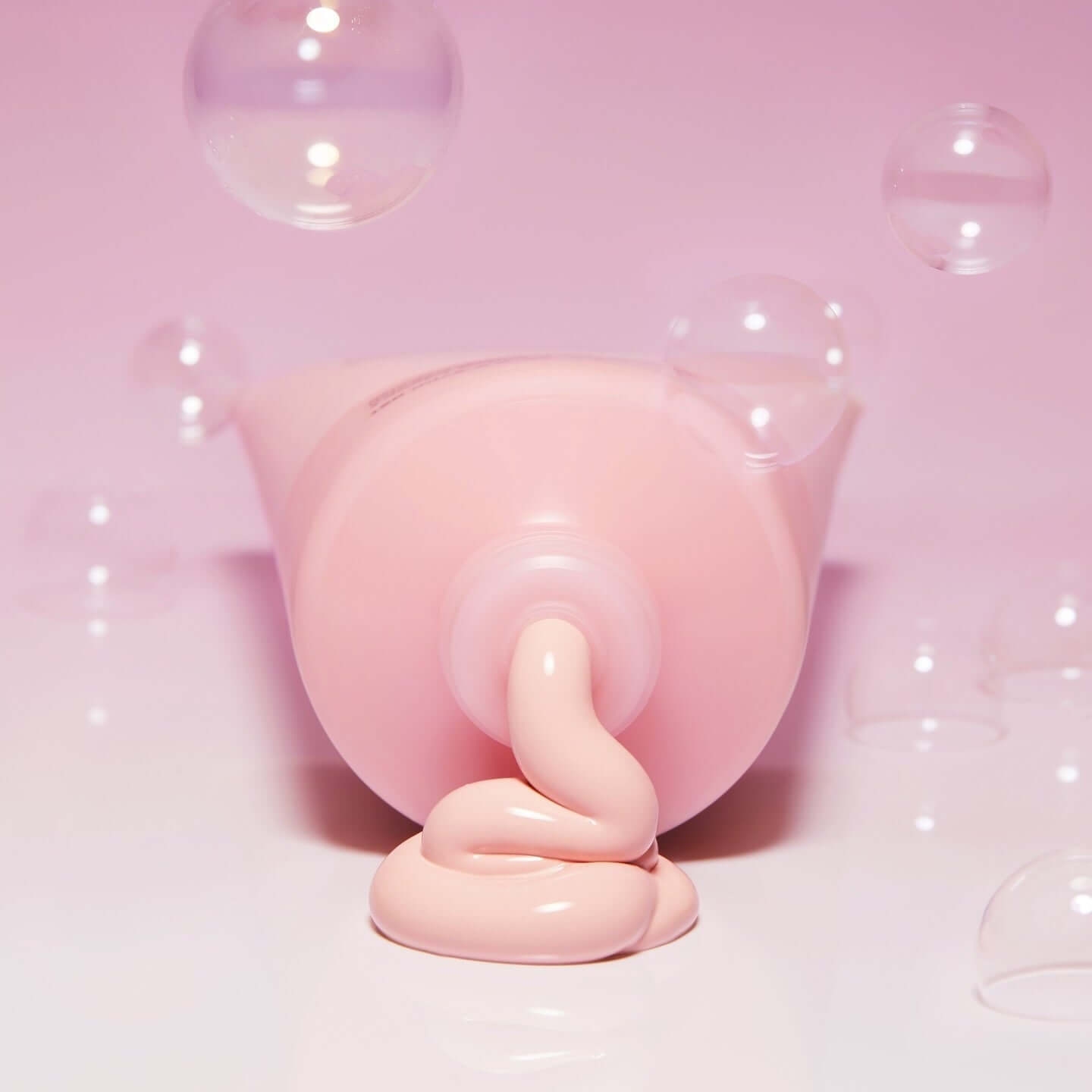 BELIF Super Knights Pore Fiming Vegan Pack Cleanser 150ml with creamy texture and pink packaging, surrounded by soap bubbles.