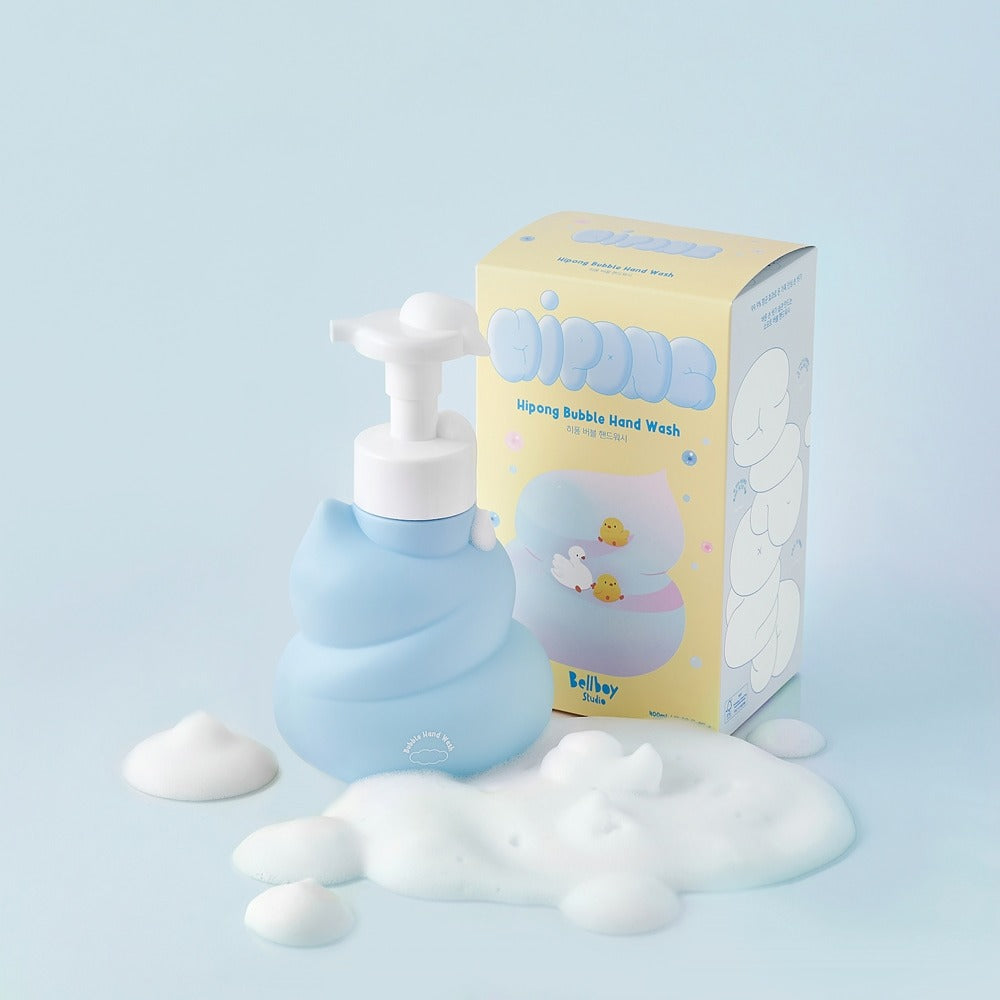 BELLBOY STUDIO Hippong Bubble Hand Wash in blue bottle with packaging, surrounded by fluffy soap bubbles on a light background.