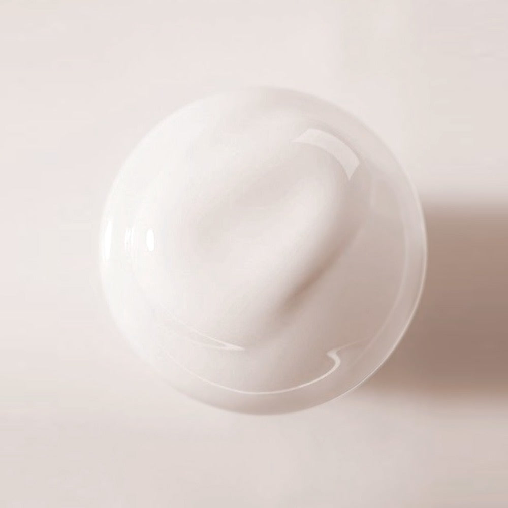 Top view of BELLBOY STUDIO Silky Shiloh Prime Conditioner 400ml showcasing creamy texture on a white background.