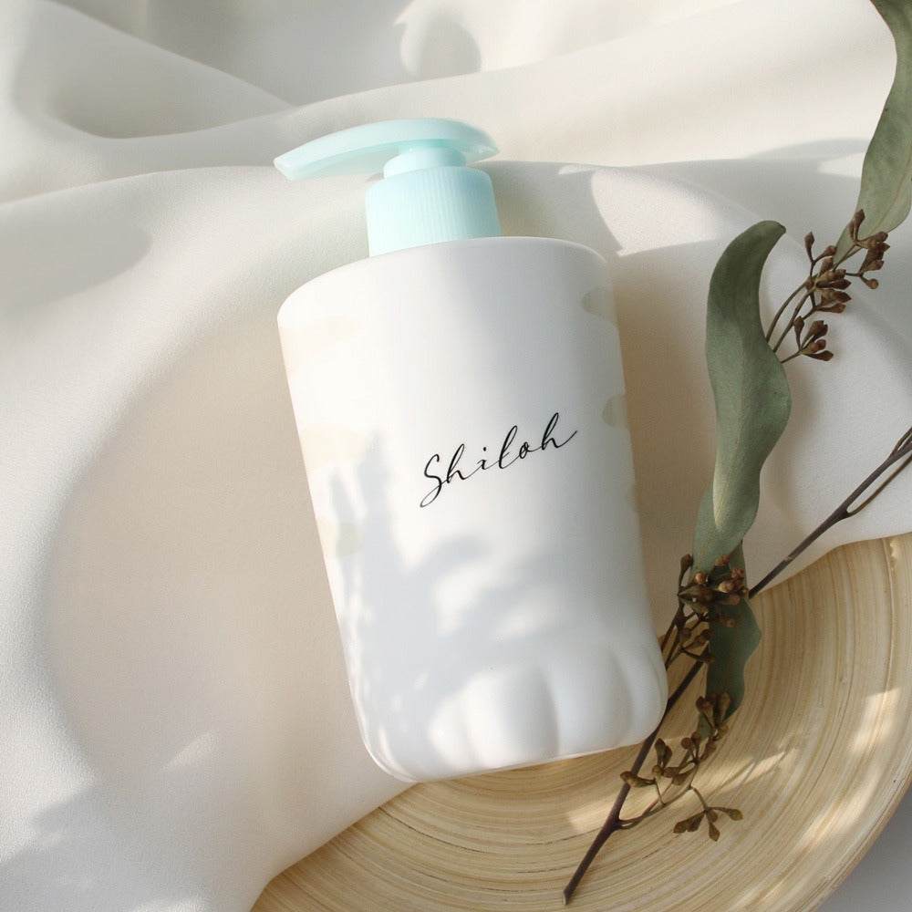 BELLBOY STUDIO Silky Shiloh Prime Shampoo 400ml in elegant packaging with natural decor setting.