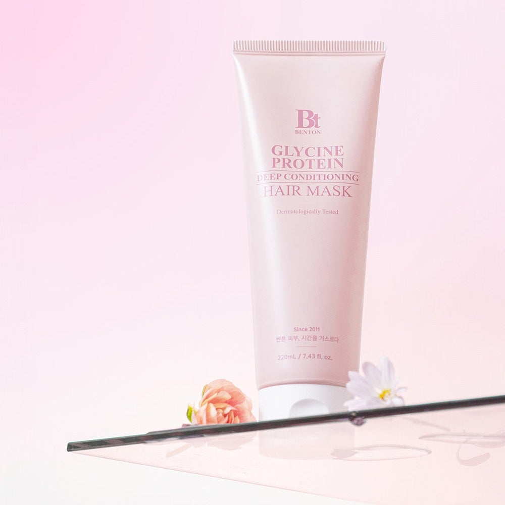 BENTON Glycine Protein Deep Conditioning Hair Mask 220ml on display with a floral background for nourishing hair care.