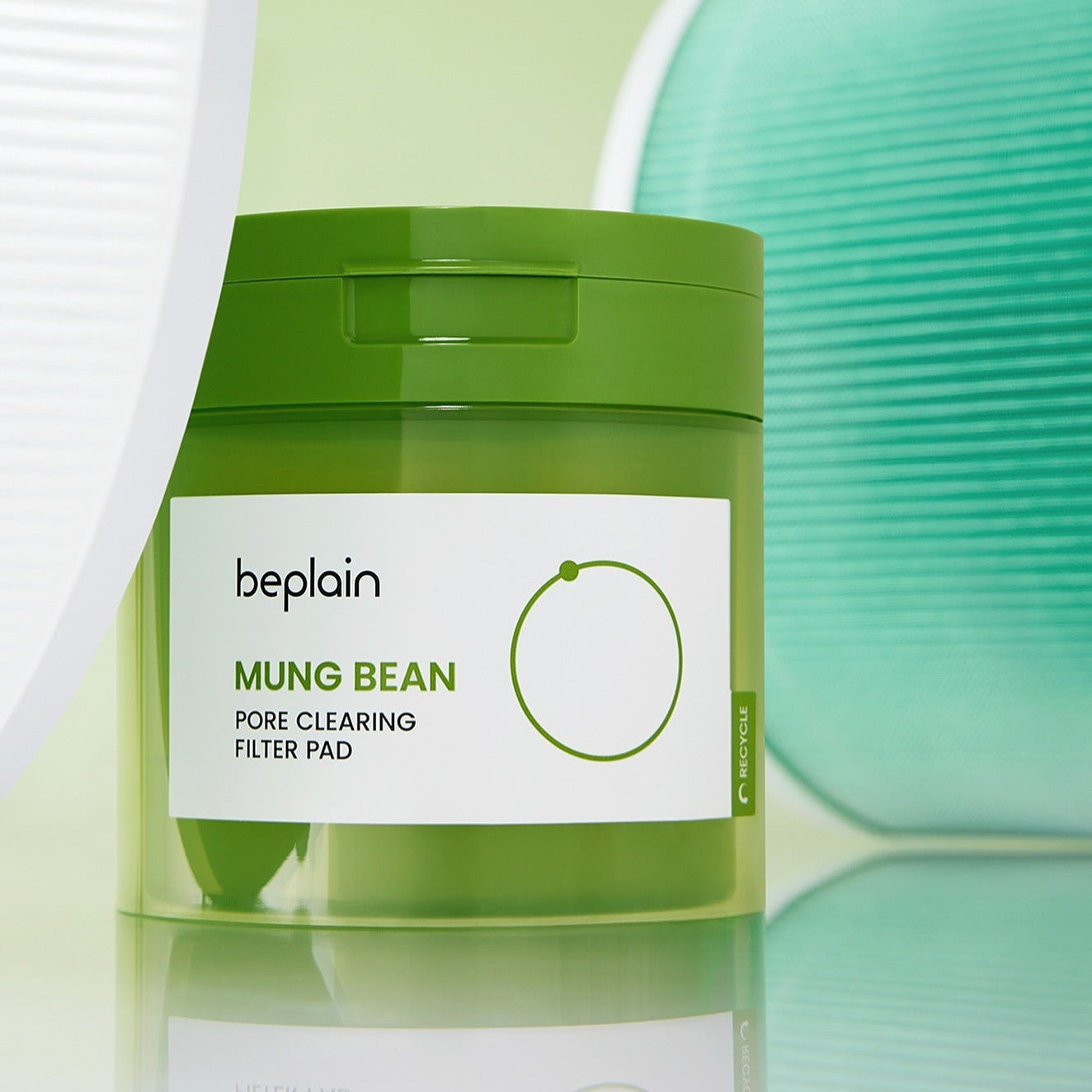 BEPLAIN Green Bean Pore Clearing Filter Pad 70 Sheets in a green container shown with textured background.