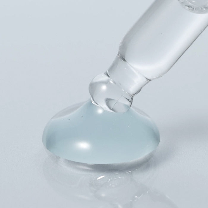 Close-up of dropper with BLITHE Targeted Hydrating Serum Hyaluronic Acid 2.0 50ml showing serum texture on white background