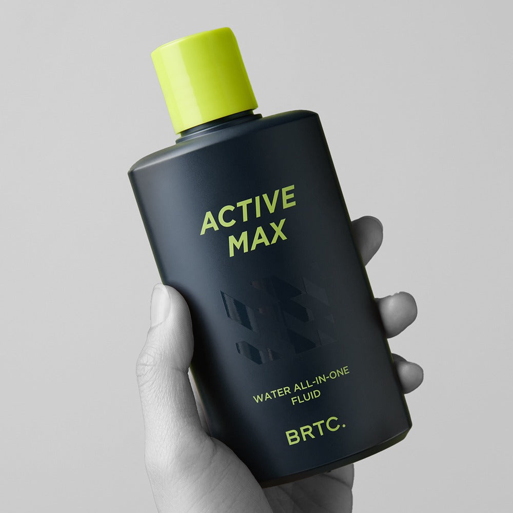 Gentleman Korea product shot of BRTC Homme Active Max Water All-in-One Fluid 150ml held in hand, men's Korean skincare for gentleman
