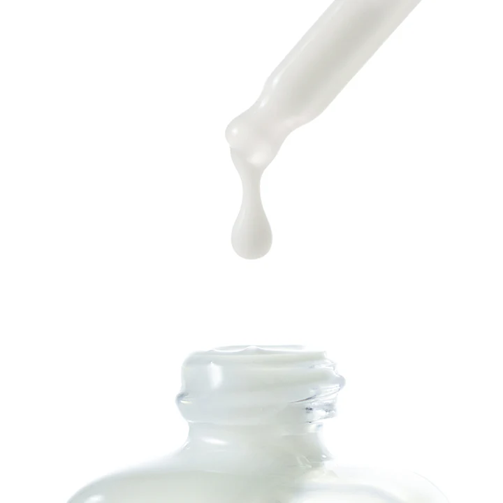 Dropper dispensing BY WISHTREND Ceramide Milky Ampoule 30ml into bottle