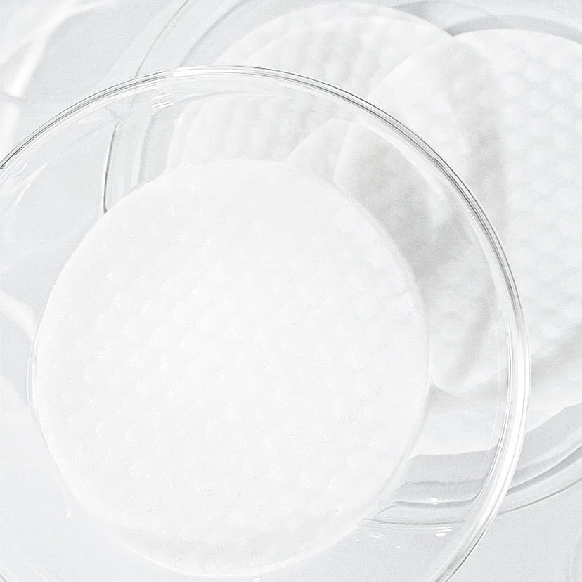 CELIMAX Ji Woo Gae One Step Body Brightening Pad 60 Pads in glass container showcasing texture