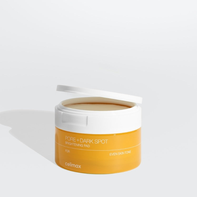 CELIMAX Pore Dark Spot Brightening Pad 40ea in open container, showcasing skincare product for even skin tone and dark spot reduction.