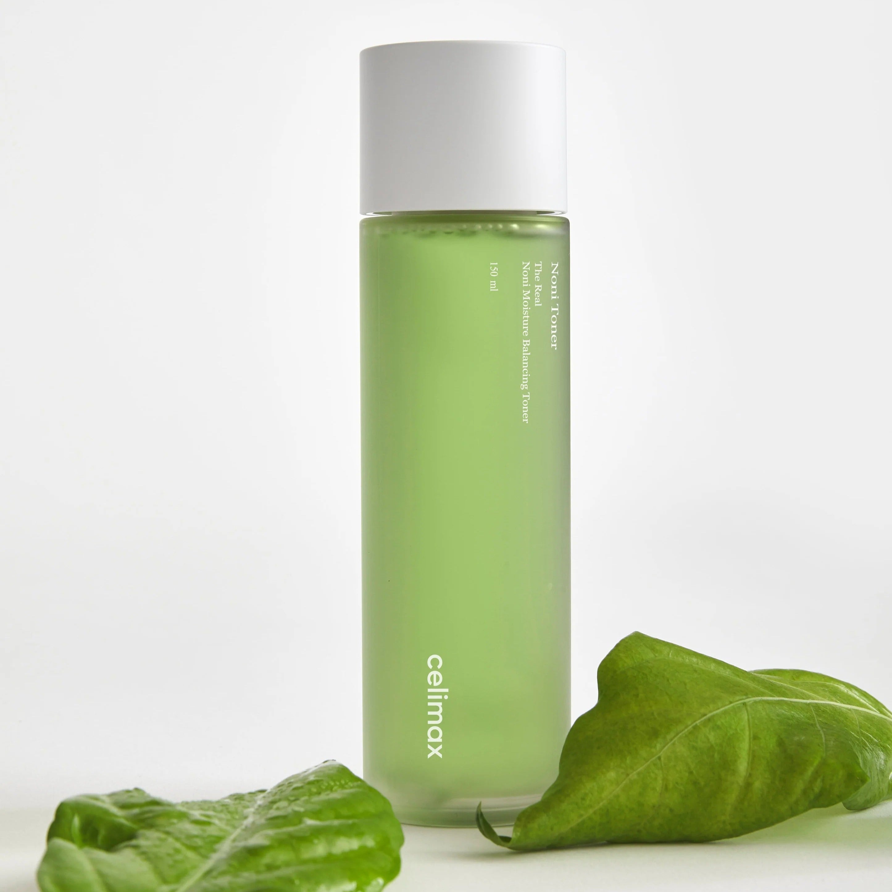 CELIMAX The Real Noni Moisture Balancing Toner 320ml bottle with green leaves