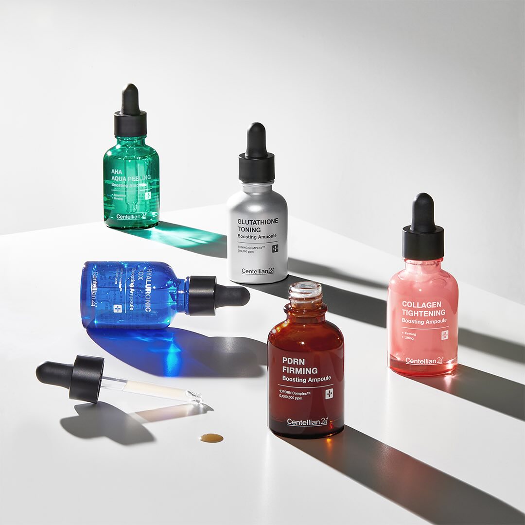 CENTELLIAN 24 Glutathione Toning Boosting Ampoule 30ml 5 Types displayed with dropper bottles on a white surface.