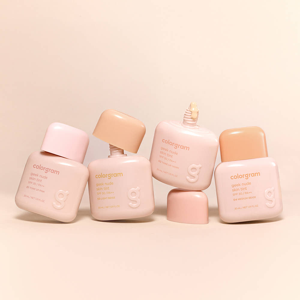 Five bottles of COLORGRAM Geek Nude SKin Tint 30ml arranged on display, highlighting the product packaging and branding.