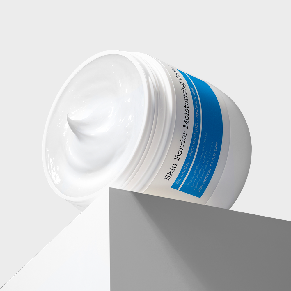 COSRX Skin Barrier Moisturizing Cream 450ml in a white jar with blue label, creamy texture, 450ml size, skincare product