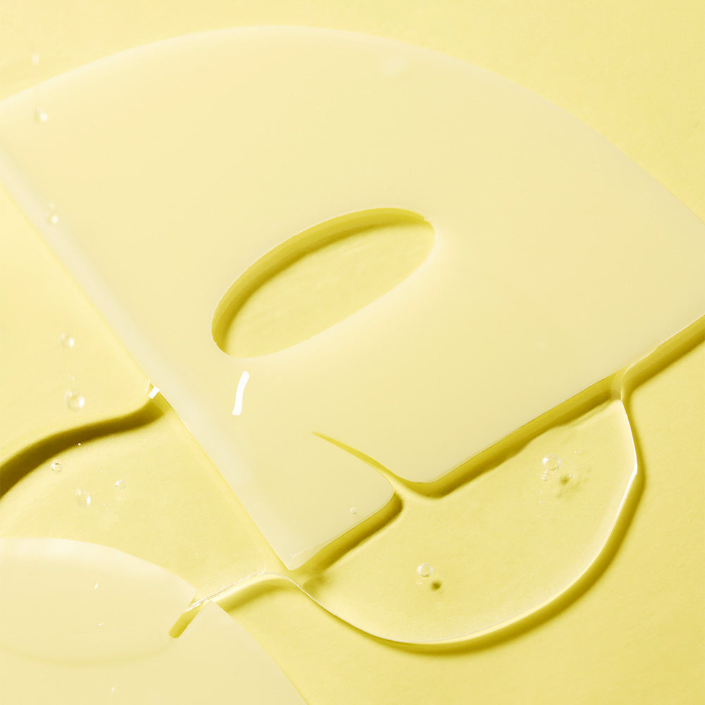 Close-up of DEWYTREE AC Deep Skin Clarity Collagen Gel Mask 4 Sheets texture on yellow background