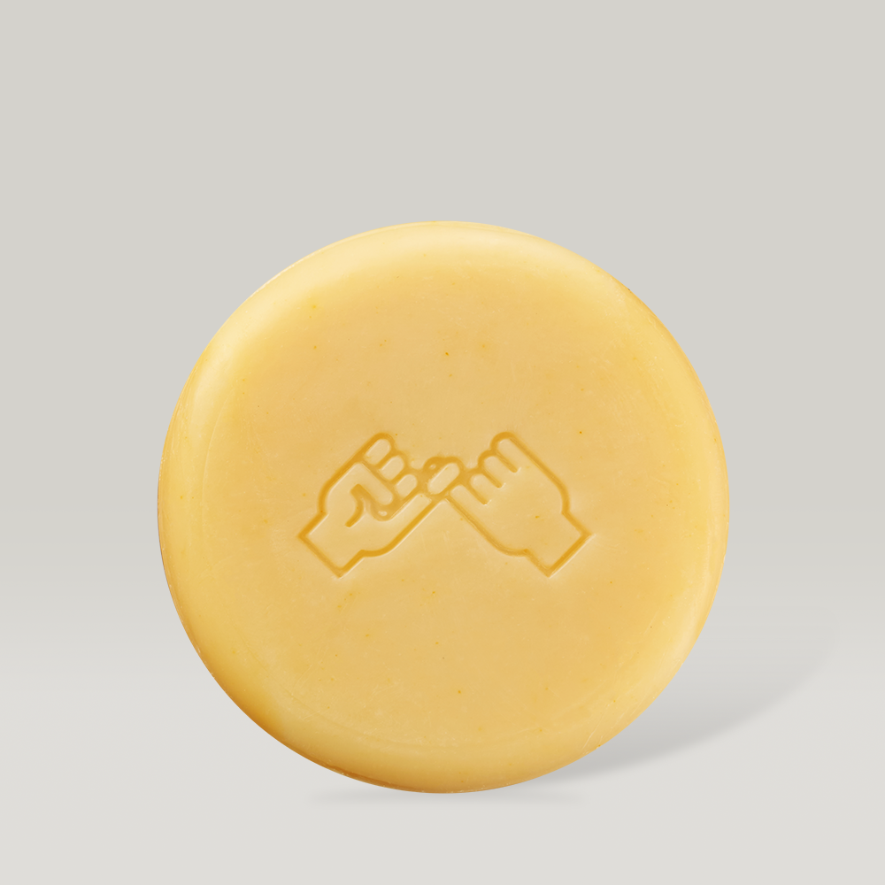 DONGGUBAT Correct Shampoo Bar For Oily Skin with embossed design on light background