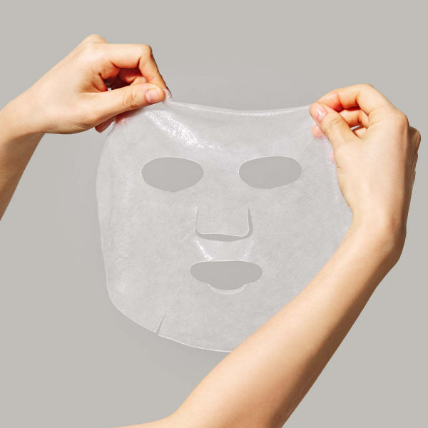Holding DR.CEURACLE Hyal Reuse Lifting Mask (10EA) sheet for skincare routine