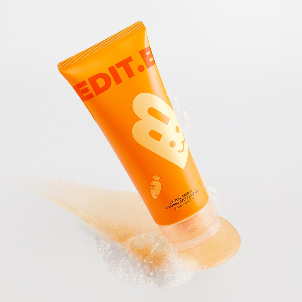 EDIT.B Joyful Carrot Foaming Gel Cleanser 150ml product image with orange packaging and smiling carrot logo.