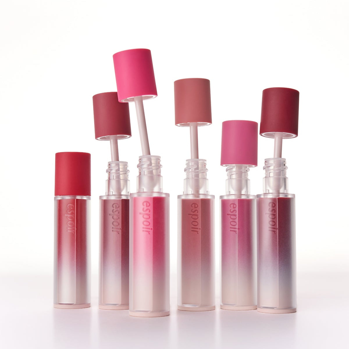 ESPOIR Couture Lip Tint Fitting Blur collection showcasing a variety of vibrant shades in sleek, modern packaging.