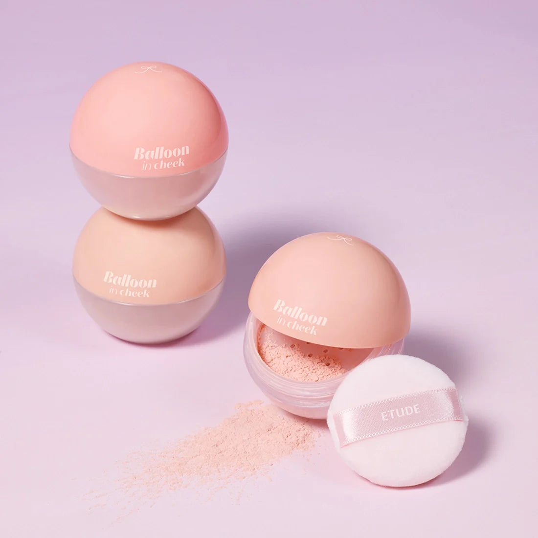 ETUDE Balloon in cheek 6g pastel blush compacts with powder and applicator on pink background