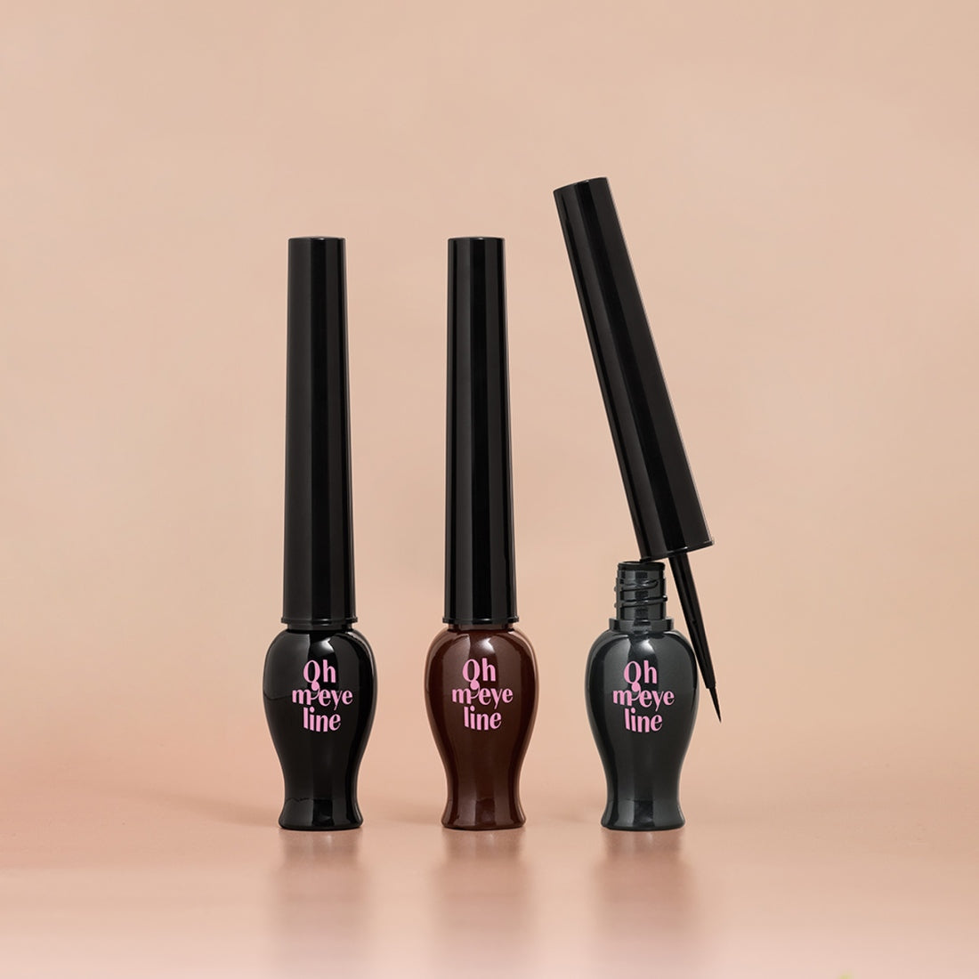 ETUDE Oh My Line liquid eyeliners in black, brown, and open black variants on a neutral background, showcasing sleek design.