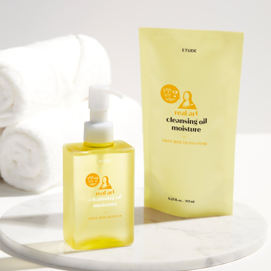 ETUDE Real Art Cleansing Oil Moisture 2-piece set (185ml+185ml) with towels in the background