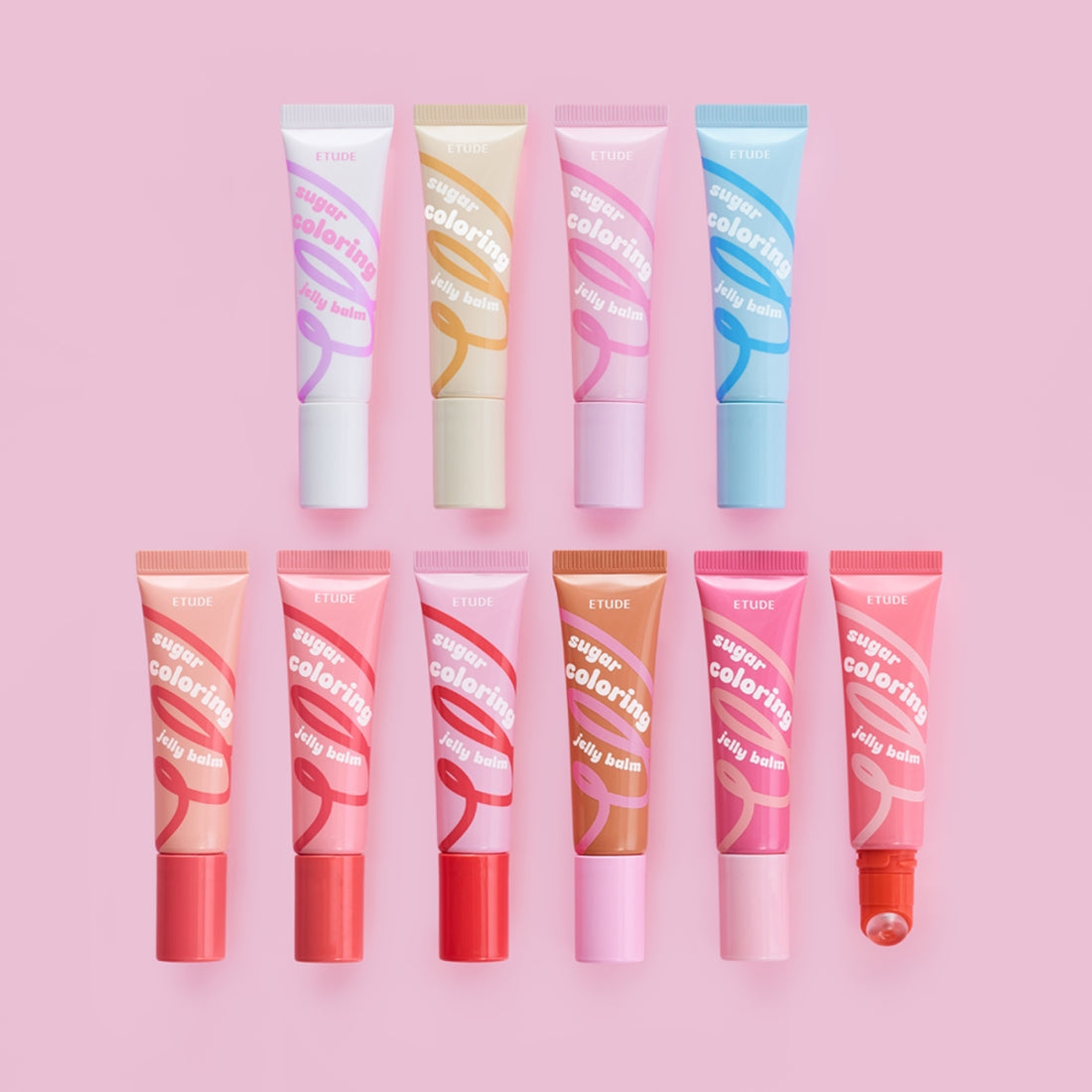 Collection of ETUDE Sugar Coloring Jelly Balm 9g in various colors on a pink background