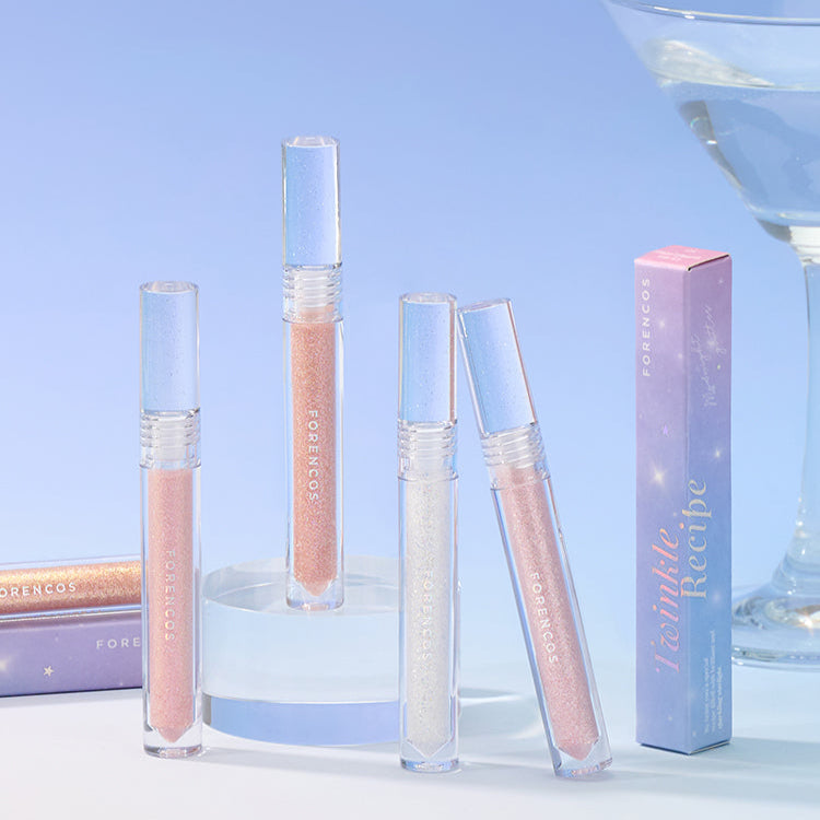 FORENCOS Starlight Liquid Glitter tubes displayed with packaging in a soft pastel setup