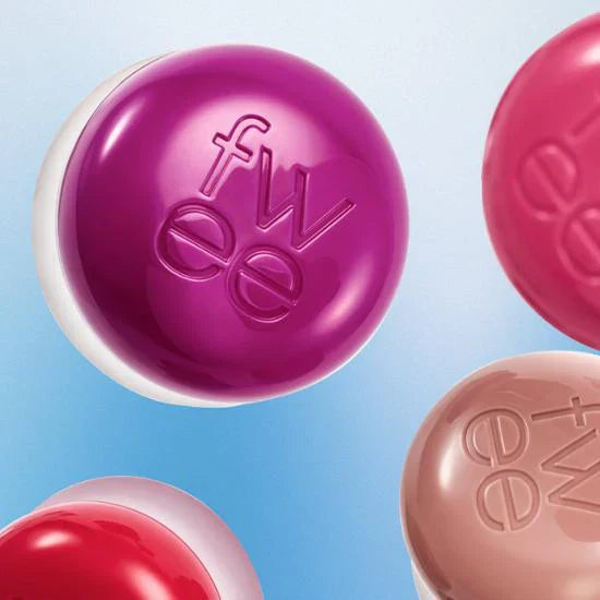 Assorted FWEE Lip & Cheek Blurry Pudding Pot collection shown in vibrant colors.