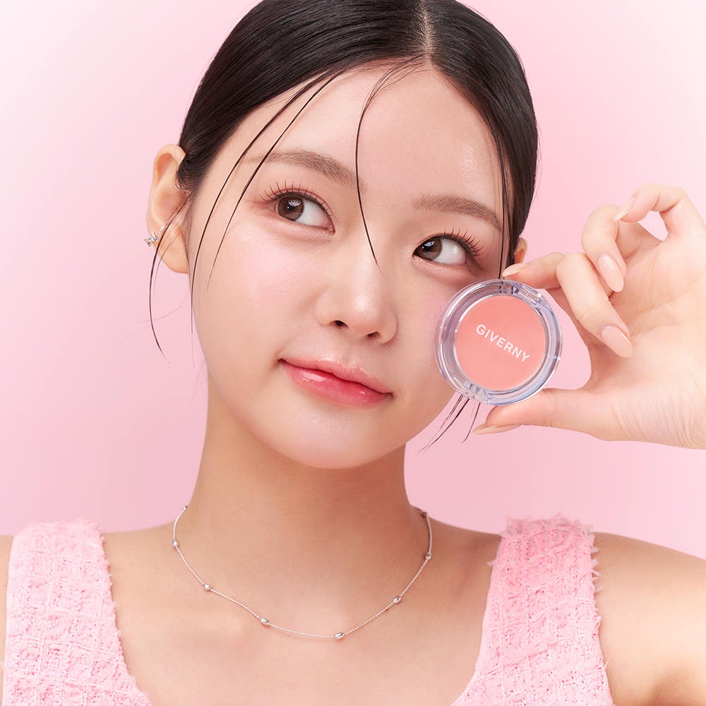GIVERNY Dewy Gel Glow Blusher 2.7g showcased by model with glowing skin against a pink background.