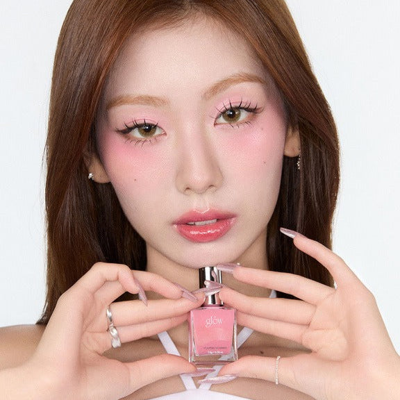 Model showcasing GLOW Cocktail Oil Blusher 7.5g for vibrant cheeks with a natural glow.
