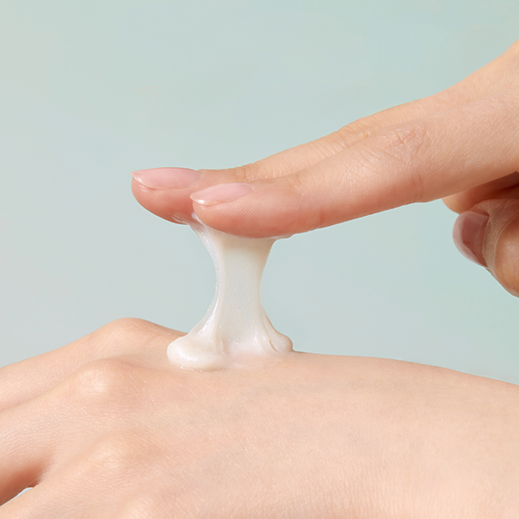 Applying GOODAL Eoseongdho Hyaluronic Soothing Pore Cleansing Foam 150ml on hand for a gentle cleanse
